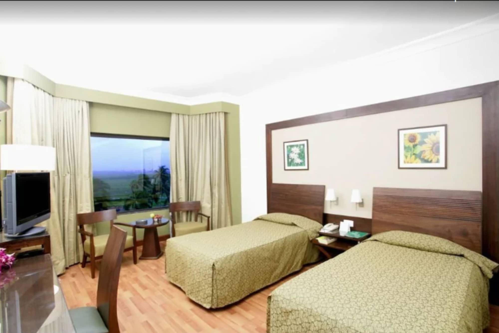 The Retreat Hotel & Convention Centre Mumbai Phòng bức ảnh